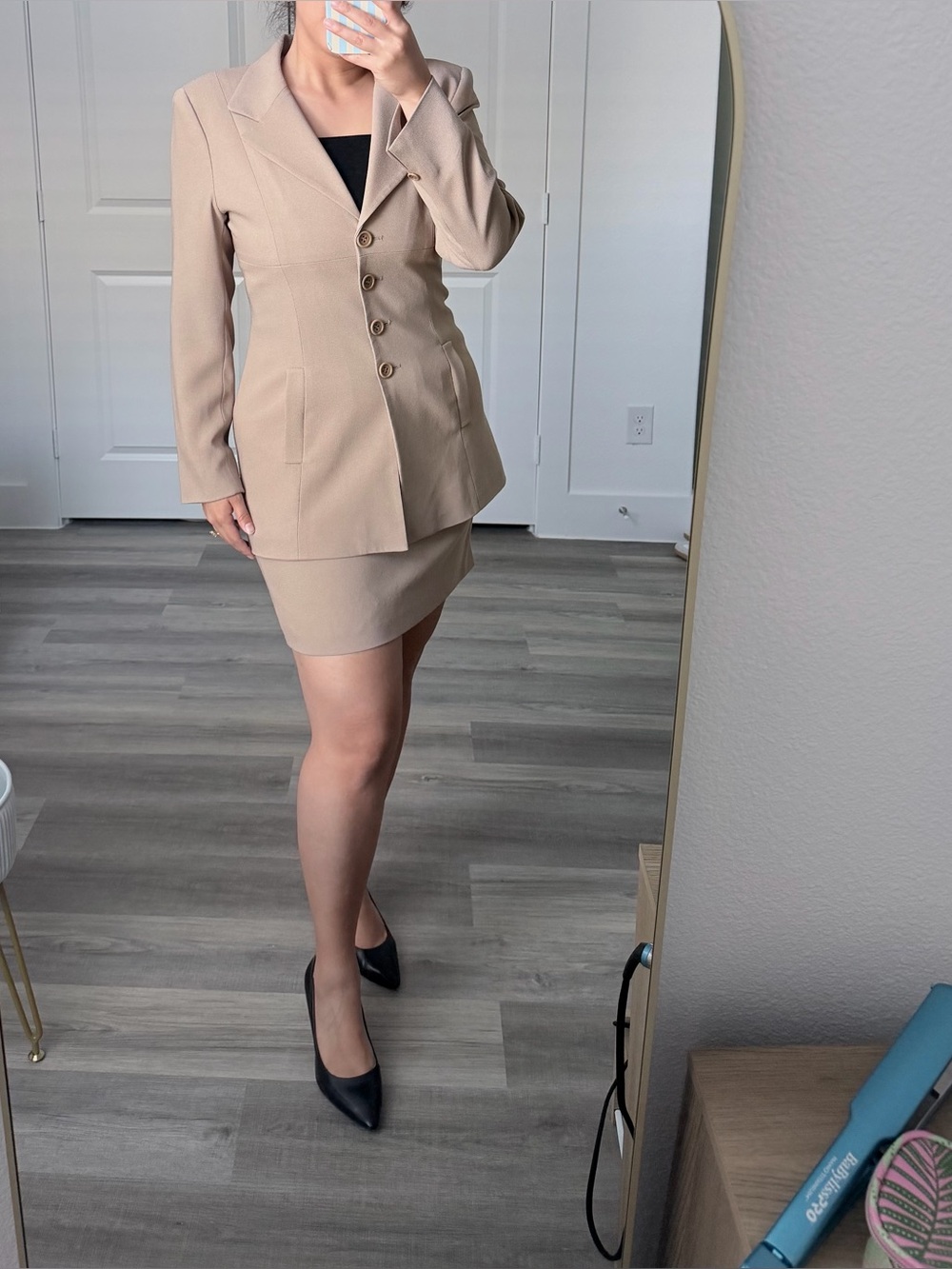 Beige skirt suit with long sleeve notch lapel
